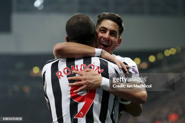 Ayoze Perez of Newcastle United celebrates with teammate Salomon Rondon after scoring his sides third goal during the Premier League match between...