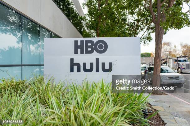 Sign with logos for Home Box Office and Hulu streaming service at regional headquarters in the Silicon Beach area of Los Angeles, California,...