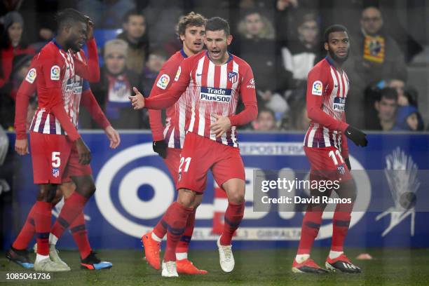 Lucas Hernandez of Atletico Madrid celebrates after scoring his sides first goal during the La Liga match between SD Huesca and Club Atletico de...