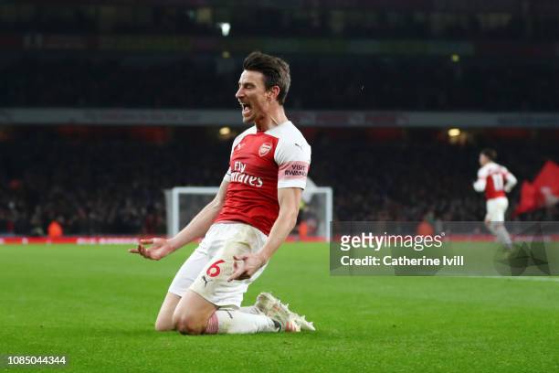Laurent Koscielny of Arsenal celebrates after scoring his team's second goal during the Premier League match between Arsenal FC and Chelsea FC at...