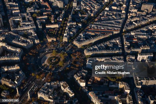 aerial view looking at place de la nation in paris france - place de la nation stock pictures, royalty-free photos & images