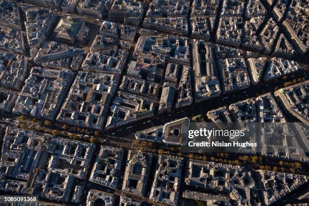 aerial view looking directly down at street and buildings in paris france - bourse stock pictures, royalty-free photos & images