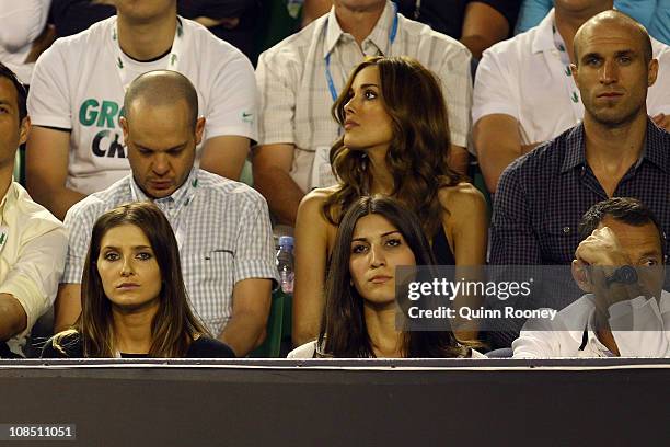 Model Rebecca Judd, with husband Carlton AFL captain Chris Judd, media personality Kate Waterhouse, and actress Radha Mitchell watch the women's...