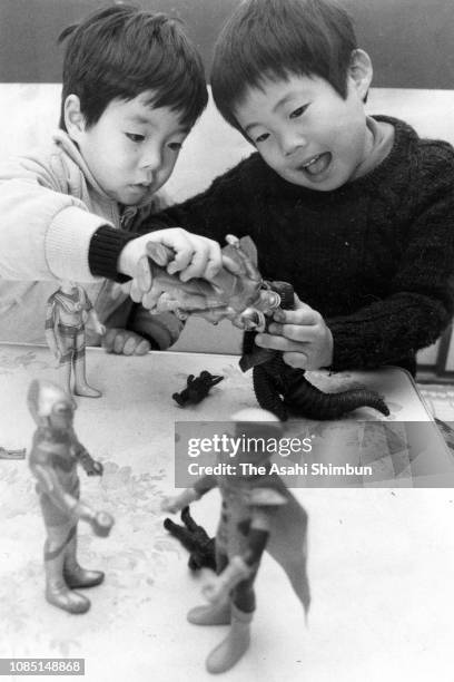 Children play with the Ultraman figures on January 11, 1980 in Japan.
