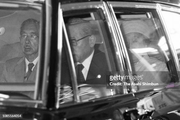 Emperor Hirohito and Empress Nagako are seen on arrival at Harajuku Station after visiting the Nasu Imperial Villa on August 14, 1980 in Tokyo, Japan.