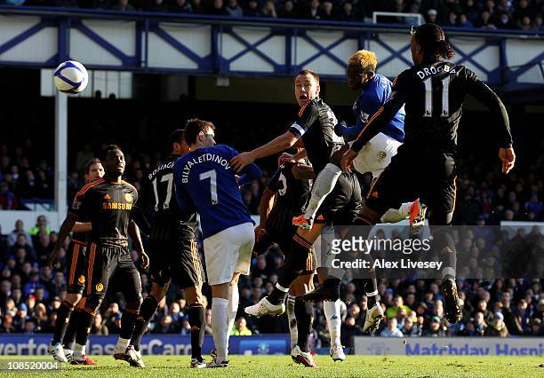 Louis Saha of Everton scores the opening goal during the FA Cup sponsored by E.On Fourth Round match between Everton and Chelsea at Goodison Park on...