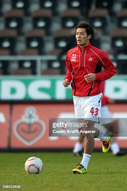 Tomoaki Maskino of Koeln warms up before the Bundesliga match between FC St. Pauli and 1. FC Koeln at Millerntor Stadium on January 29, 2011 in...