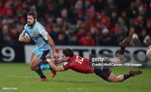 Exeter Chiefs's Santiago Cordero and Munster's Joey Carbery during the Heineken European Challenge Cup, pool two match at Thomond Park, Limerick.