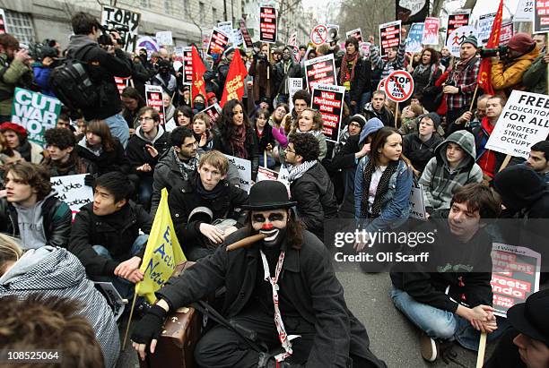 Student demonstrators march to Parliament to protest against the Government's cuts to public services and an increase in tuition fees on January 29,...