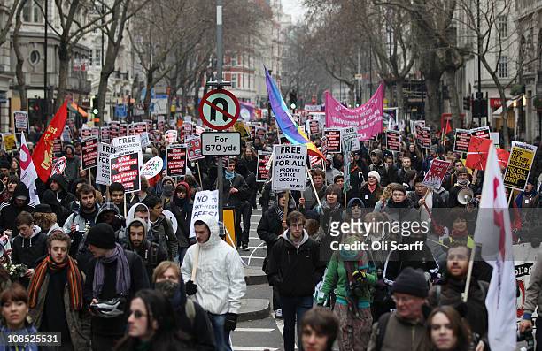 Student demonstrators march to Parliament to protest against the Government's cuts to public services and an increase in tuition fees on January 29,...