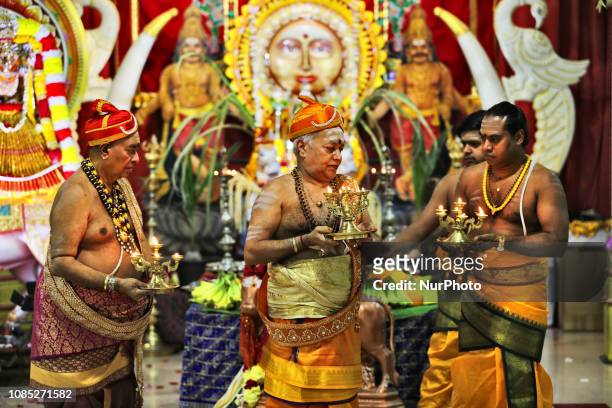 Tamil Hindu priests perform special prayers honouring Lord Surya during the Thai Pongal Festival at a Hindu temple in Ontario, Canada on January 14,...