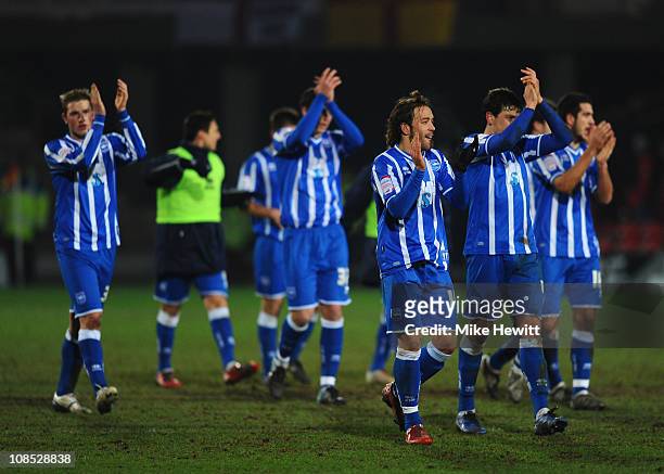 Brighton players salute their fans at the end of the FA Cup Sponsored by E.ON 4th Round match between Watford and Brighton & Hove Albion at Vicarage...