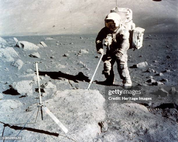 Harrison Schmitt works the scoop on the lunar surface, Apollo 17 mission, December 1972. US astronaut Harrison Schmitt , the 12th man to walk on the...