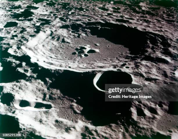 Close-up view of a crater on the surface of the Moon. Artist NASA.