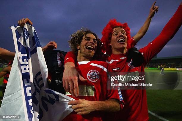 Sergio Torres and Glenn Wilson of Crawley Town celebrate their 1-0 victory during the FA Cup sponsored by E.ON 4th round match between Torquay United...