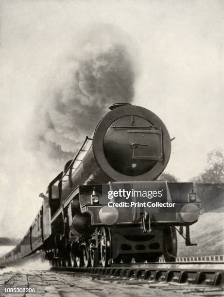 The Princess Royal, a 4-6-2 type express engine on the L.M.S. System, designed for hauling, without assistance, loads of 500 tons on non-stop runs...