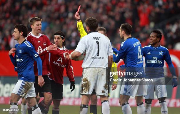 Gojko Kacar of Hamburg is sent off the pitch after a red card during the Bundesliga match between 1. FC Nuernberg and Hamburger SV at Easy Credit...