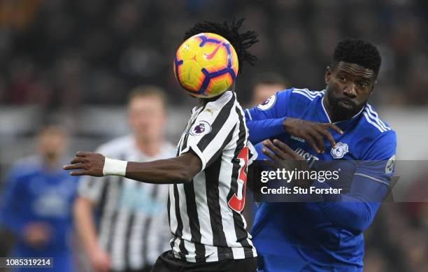 Newcastle player Christian Atsu is challenged by Bruno Ecuele Manga during the Premier League match between Newcastle United and Cardiff City at St....