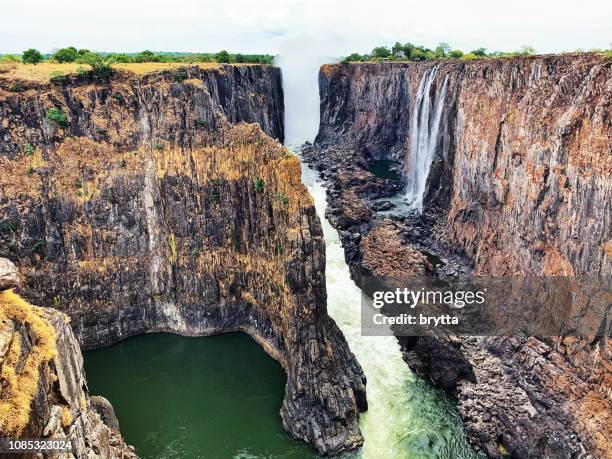 victoria falls seen from the zambian side - victoria falls stock pictures, royalty-free photos & images