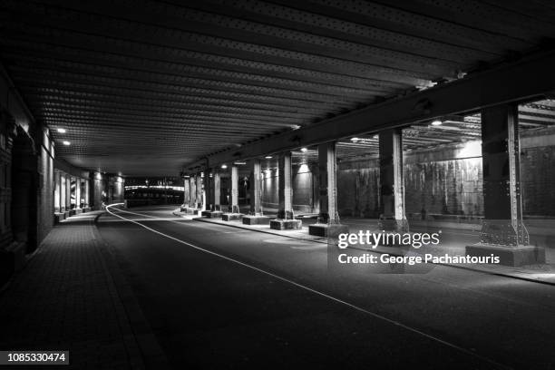 underpass at night in black and white - amsterdam night stock pictures, royalty-free photos & images