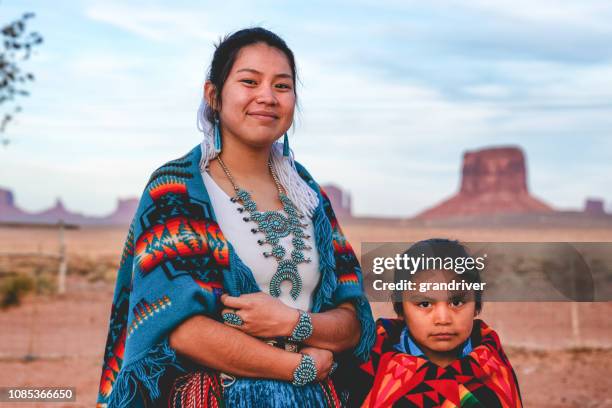 a young navajo brother and sister who live in monument valley, arizona - ethnic family stock pictures, royalty-free photos & images