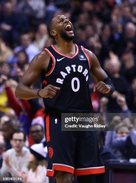Miles of the Toronto Raptors celebrates after sinking a 3 pointer during the first half of an NBA game against the Memphis Grizzlies at Scotiabank...