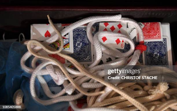 Ropes and cards, accessories for magic tricks, are pictured at the Magic Academy in Pullach near Munich, southern Germany, on November 29, 2018. -...