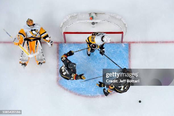 Jonathan Marchessault of the Vegas Golden Knights celebrates with teammate Brandon Pirri after scoring a goal against Casey DeSmith and Marcus...