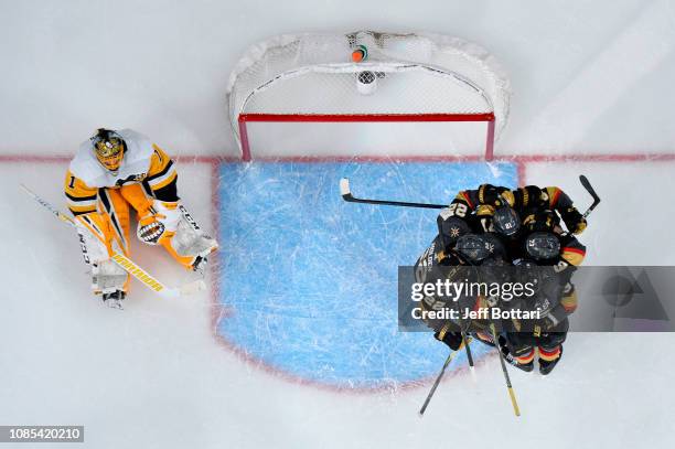 Jonathan Marchessault of the Vegas Golden Knights celebrates with teammates after scoring a goal against Casey DeSmith of the Pittsburgh Penguins...