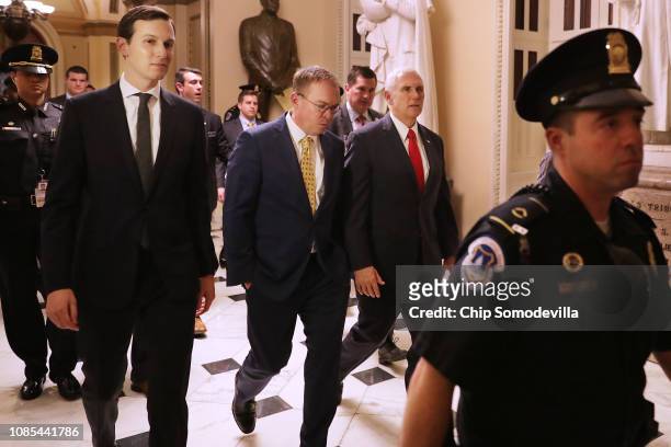 White House Senior Advisor Jared Kushner, acting Chief of Staff Mick Mulvaney and Vice President Mike Pence walk from the House of Representatives to...