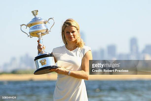 Kim Clijsters of Belgium poses with the Daphne Akhurst Trophy after winning the 2011 Women's Australian Open final, at Brighton Beach on January 30,...