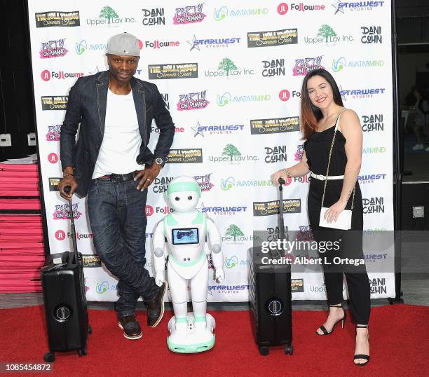 Sheldon Robbins and Lianne Tammi pose with Follow Me Luggage at Danielle Cohn's Music Video Release Party For "Lights Camera Action!" held at...