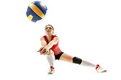 Female professional volleyball player isolated on white