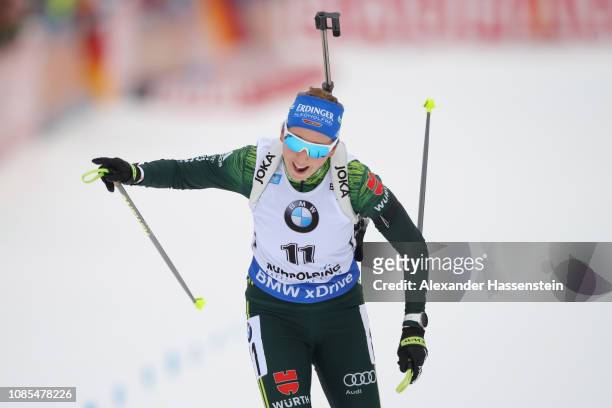 Franziska Preuss of Germany celebrates winning the Women 12.5 km Mass Start during the IBU Biathlon World Cup at Chiemgau Arena on January 20, 2019...