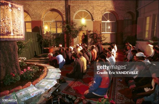 Group of Muslims are praying for peace in the courtyard of the Sant' Egidio Community Center at the end of an inter-religious "Islamic Christian...