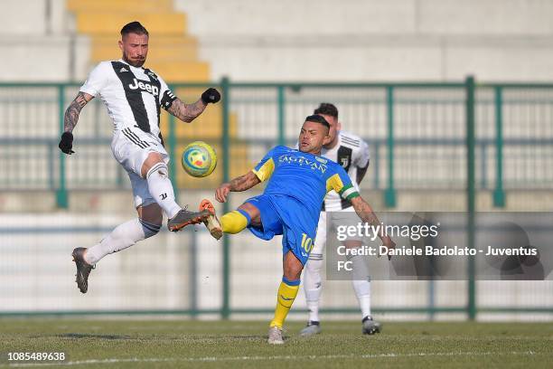 Juventus player Lorenzo Di Pardo and Carrarese player Francesco Tavano during the Serie C match between Juventus U23 and Carrarese at on January 20,...