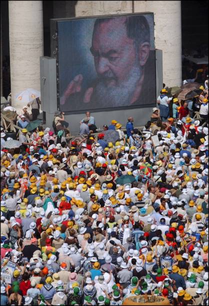 Hundreds of thousands of pilgrims jam St Peter's square to see pope John Paul II make a Saint of Padre Pio, a 20th century mystic monk who is said to...