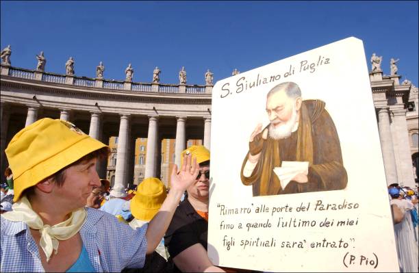 Hundreds of thousands of pilgrims jam St Peter's square to see pope John Paul II make a Saint of Padre Pio, a 20th century mystic monk who is said to...