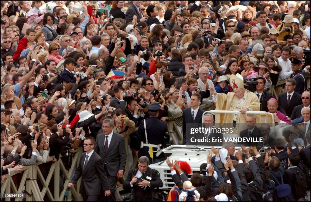 Pope John Paul II canonizes Opus Dei founder Jose Maria Escriva de Balaguer before one of the biggest crowds ever to flood the Vatican in Rome, Italy on October 6th, 2002.
