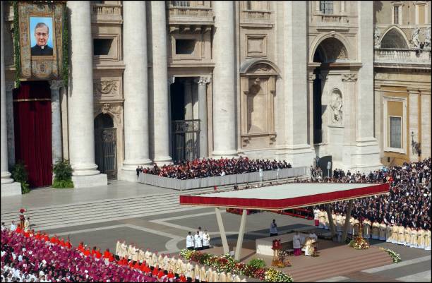 Pope John Paul II canonizes Opus Dei founder Jose Maria Escriva de Balaguer before one of the biggest crowds ever to flood the Vatican in Rome, Italy...
