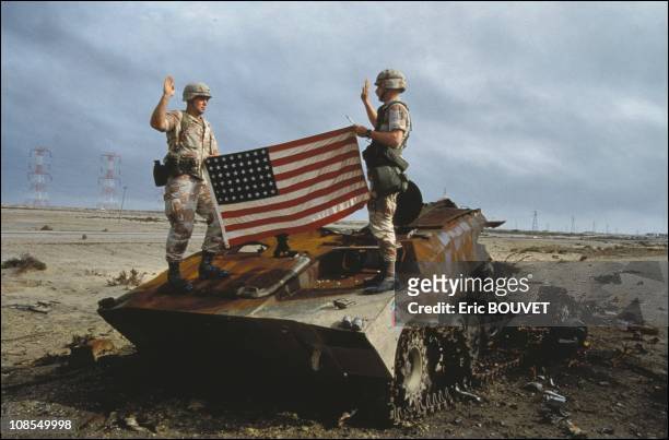 Soldiers take oath to the US army on an Iraqi destroyed tank in Iraq on February 27th, 1991.