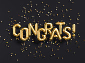 Congrats text with golden confetti.