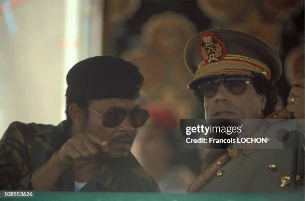 President of Ghana Jerry John Rawlings, Muammar Al Qadhafi in Tripoli, Libya in August , 1987.