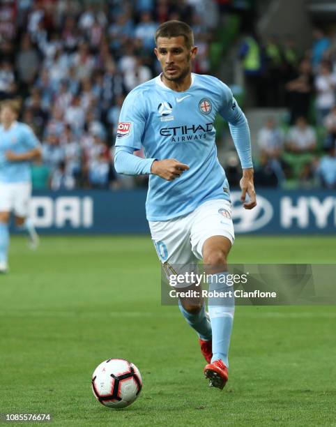 Dario Vidosic of Melbourne City runs with the ball during the round nine A-League match between Melbourne City and Melbourne Victory at AAMI Park on...