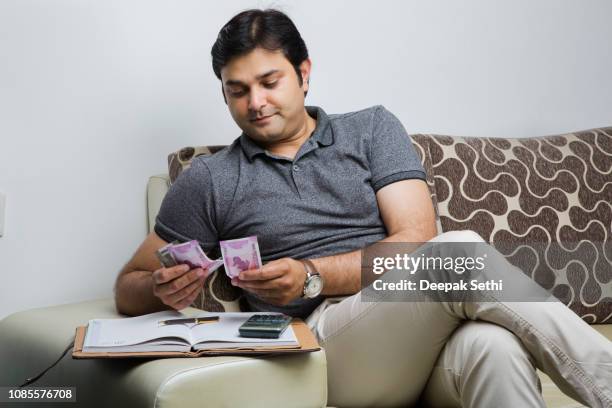 indian adult man - stock images - india market stock pictures, royalty-free photos & images