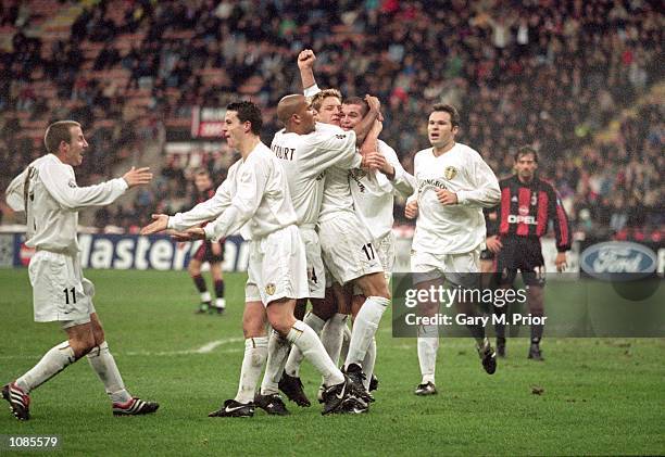 Leeds United celebrate Dominic Matteo's goal during the UEFA Champions League match against AC Milan at the San Siro in Milan, Italy. The match was...