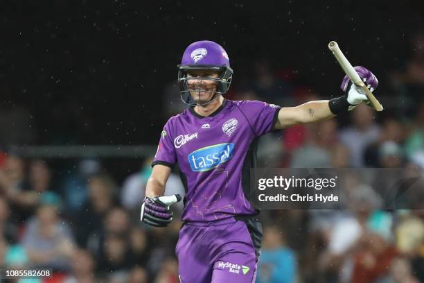 Johan Botha of the Hurricanes holds his broken bat during the Brisbane Heat v Hobart Hurricanes Big Bash League Match at Metricon Stadium on December...
