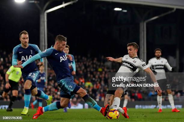 Tottenham Hotspur's Belgian defender Toby Alderweireld vies with Fulham's English defender Joe Bryan during the English Premier League football match...