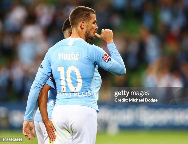 Dario Vidosic of the City getsures to fans as he celebrates a goal during the round nine A-League match between Melbourne City and Melbourne Victory...