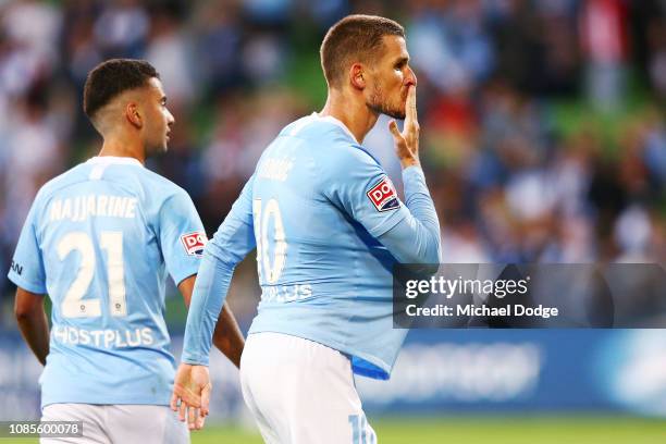 Dario Vidosic of the City gestures to fans as he celebrates a goal during the round nine A-League match between Melbourne City and Melbourne Victory...